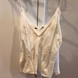 AOTC cream cami with flower detail. NWOT